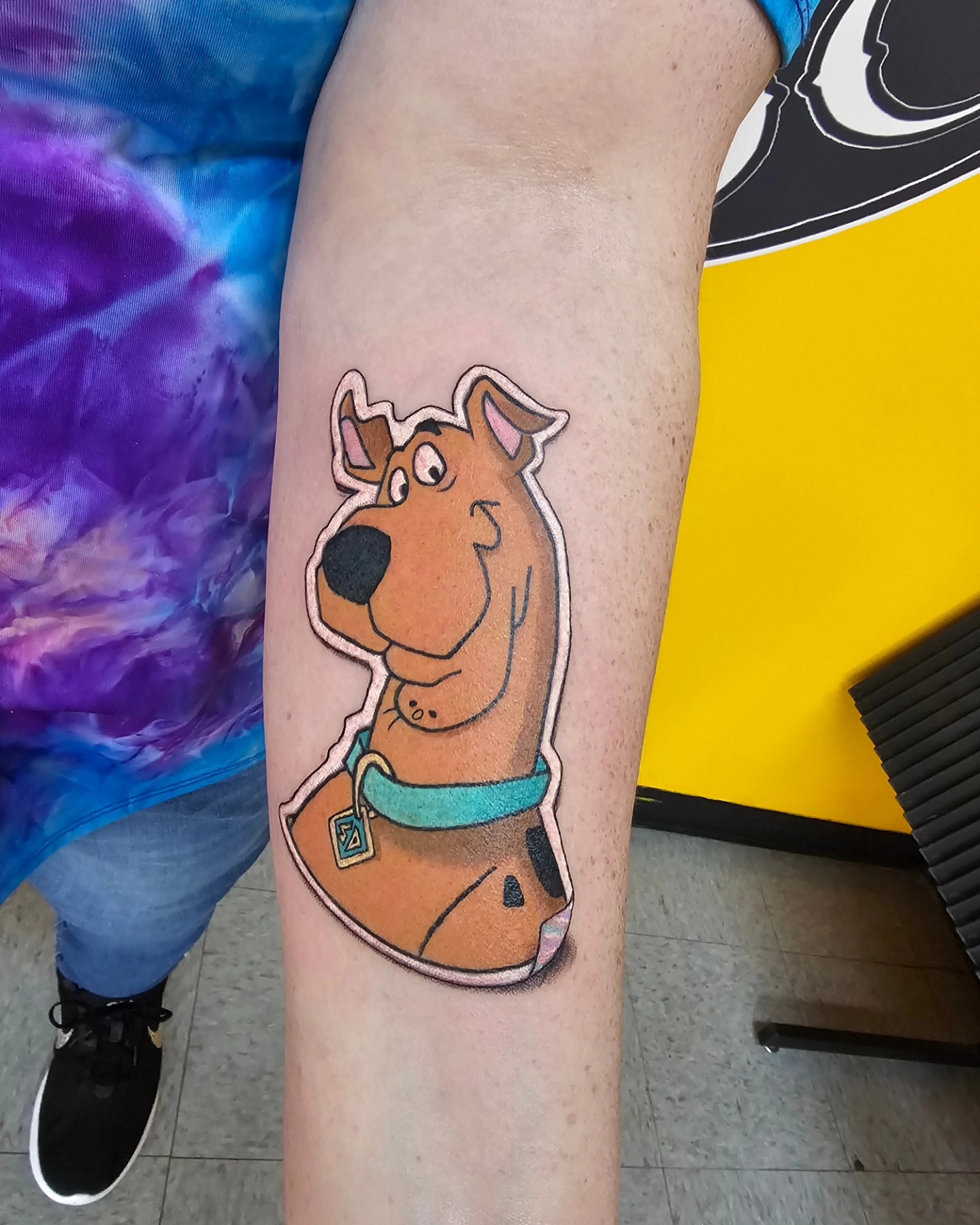 Scooby-Doo illustrative tattoo on the forearm by Mike Stamper