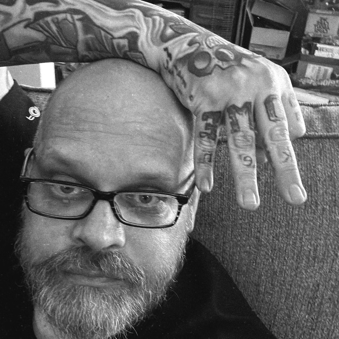 Tattooed hand black and grey tattoo on the hand by Dawne Michele