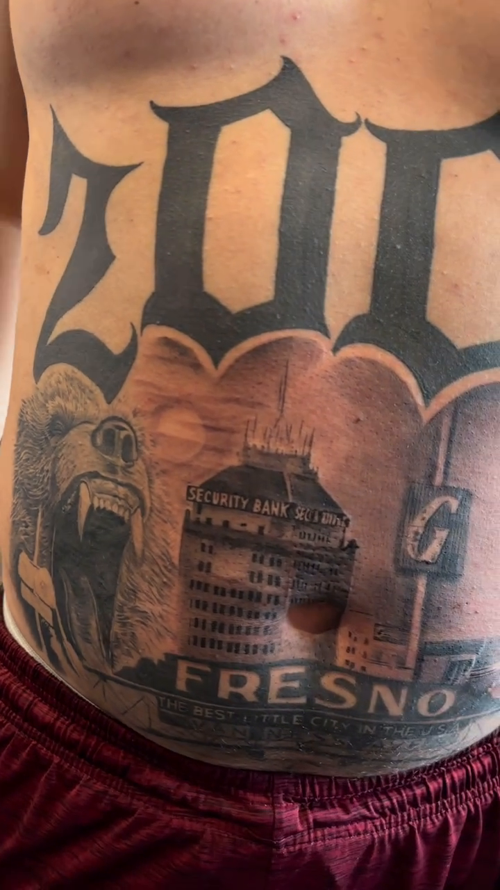 Fresno skyline and text realism tattoo by Bernie calderon, Fresno, California