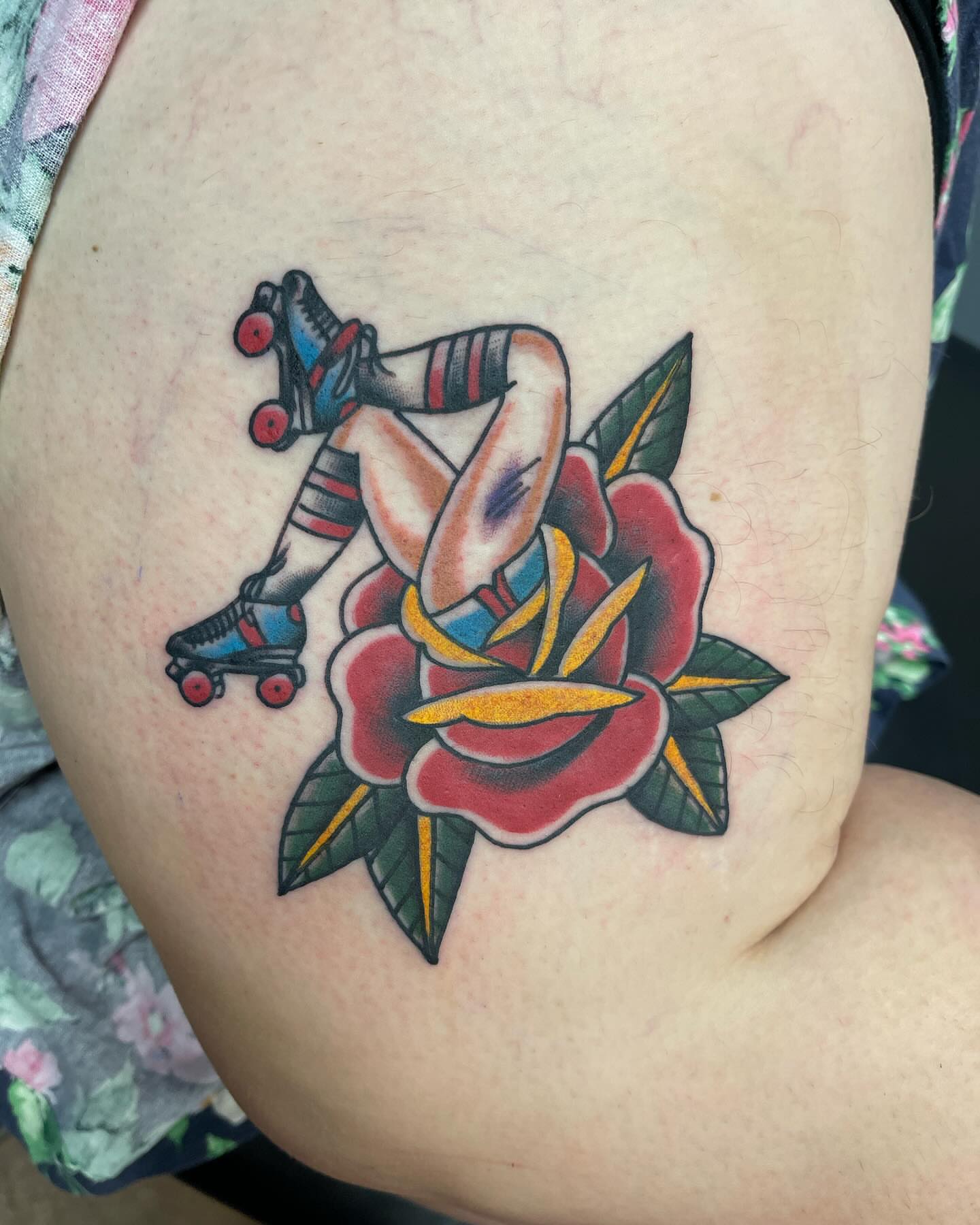 Roller skater and rose American traditional tattoo on the thigh by 💀good To the Grave💀