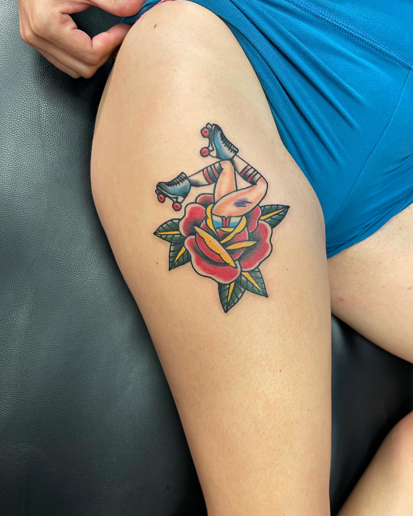Roller skater and rose American traditional tattoo on the thigh by 💀good To the Grave💀