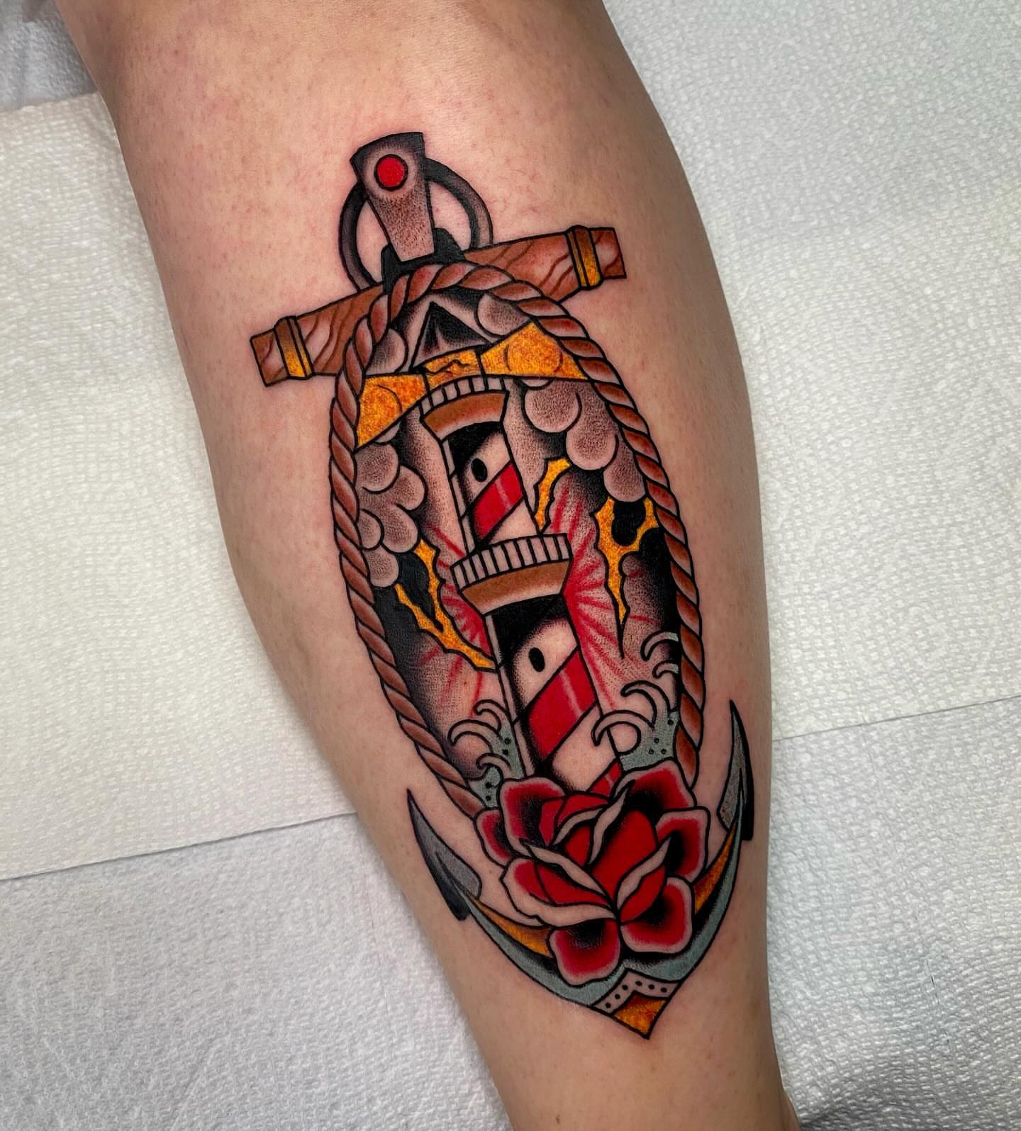 Anchor with rope and rose American traditional tattoo on the forearm by Justin R. Mitchell, Fort Worth, Texas