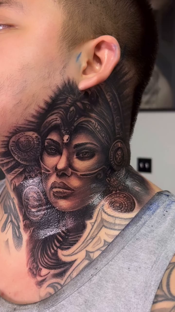 Woman's face with ornate headdress realism tattoo by @young_sely