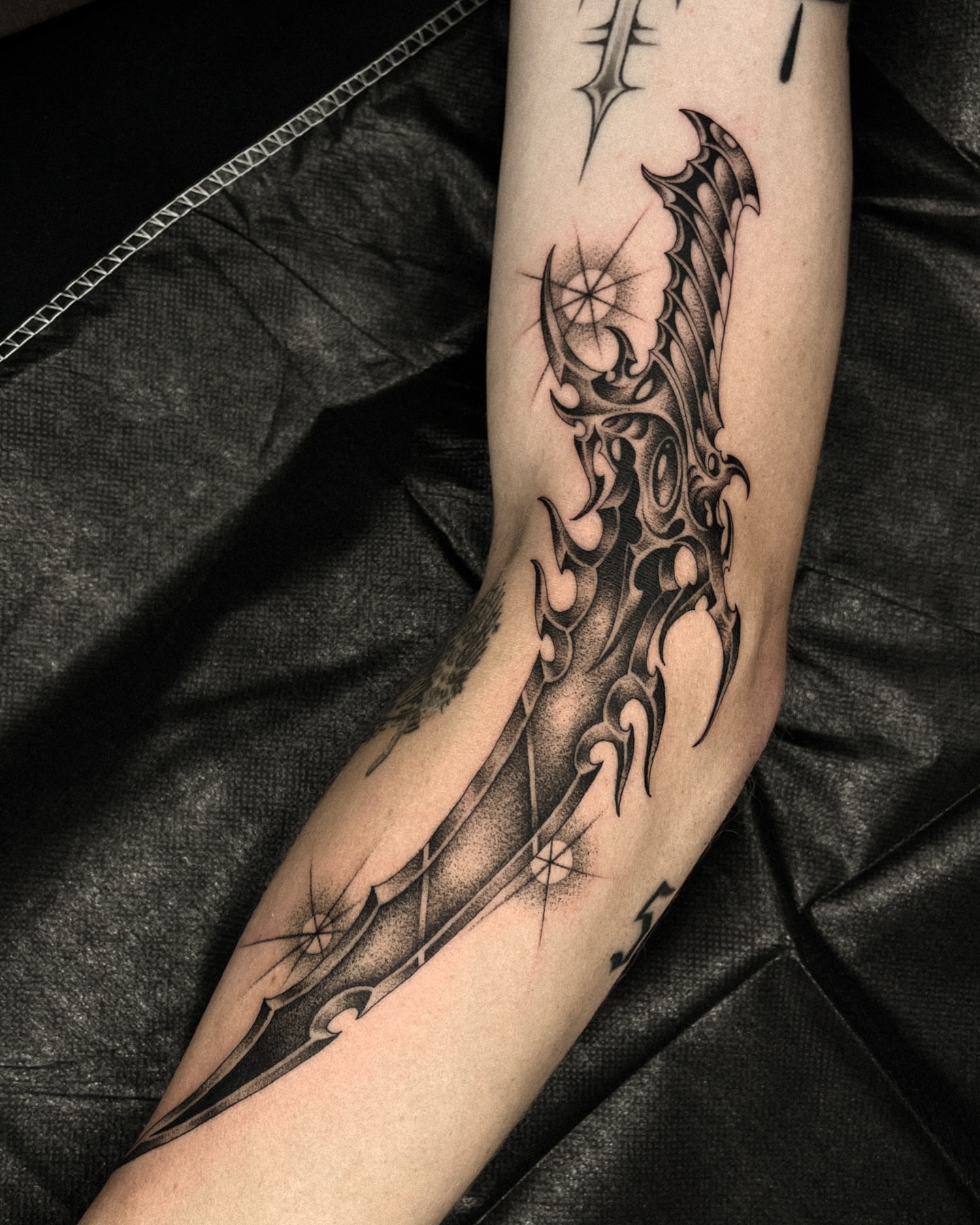 Tribal dragon tribal tattoo on the forearm by David Ha