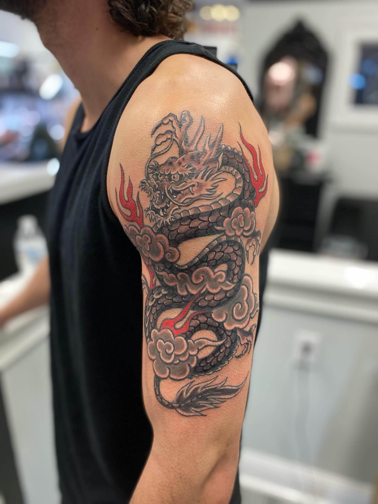 Dragon japanese irezumi tattoo on the upper arm by Missy (Miz)