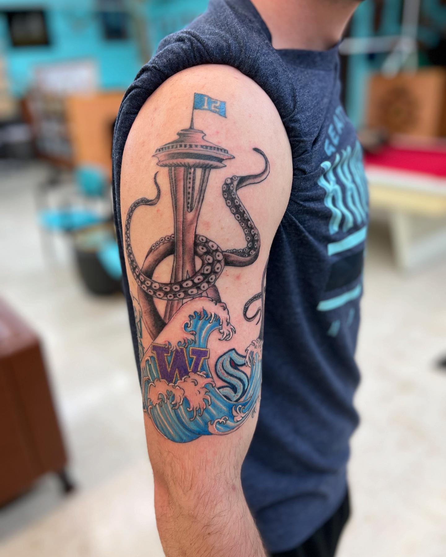 Octopus and tower American traditional tattoo on the forearm by Levi Sawdon, Everett, Washington