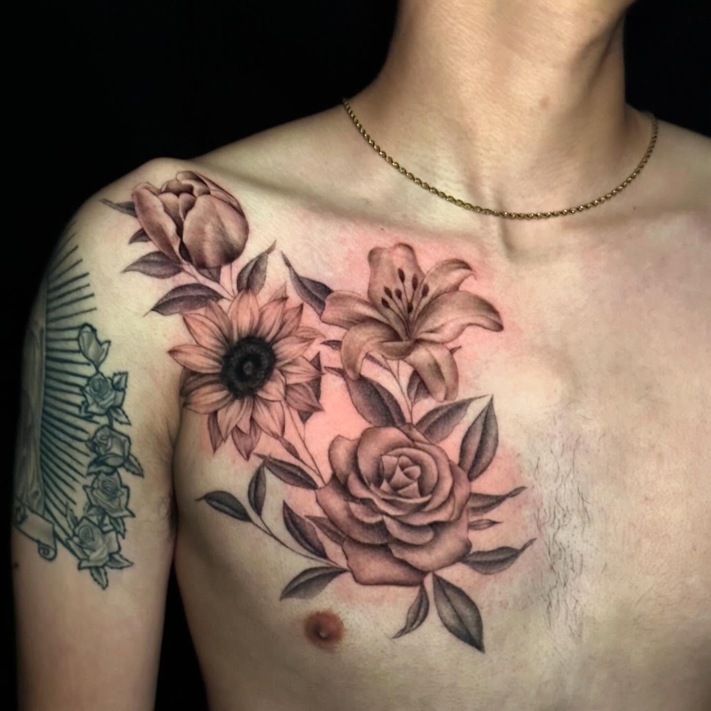 Flowers realism tattoo on the chest by Summers