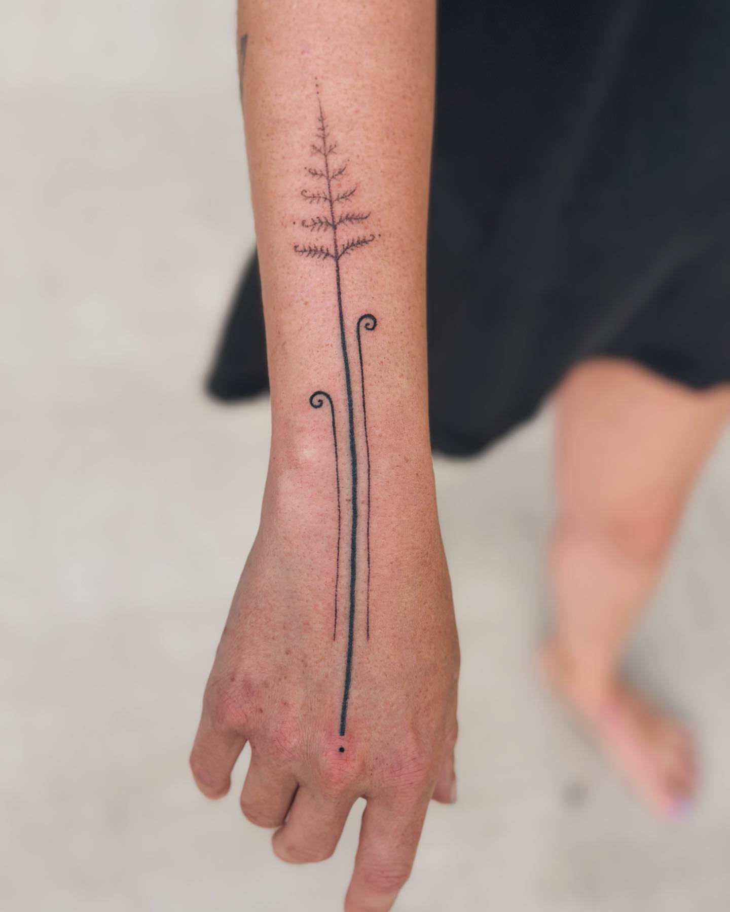 Abstract line art fine line tattoo on the forearm by Gaya