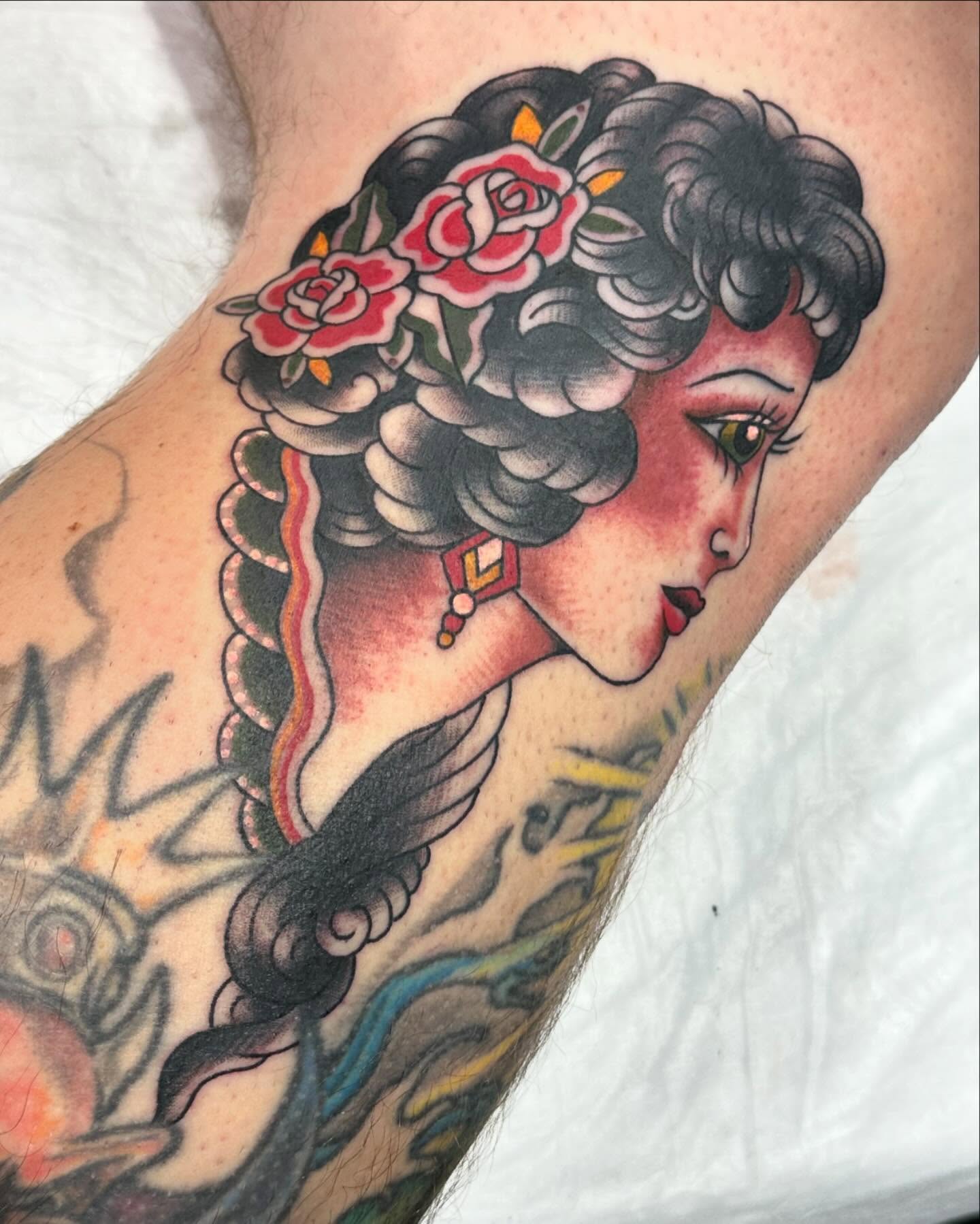 Woman with roses American traditional tattoo on the forearm by Jenni Hand - Tattoo, Maryville, Tennessee