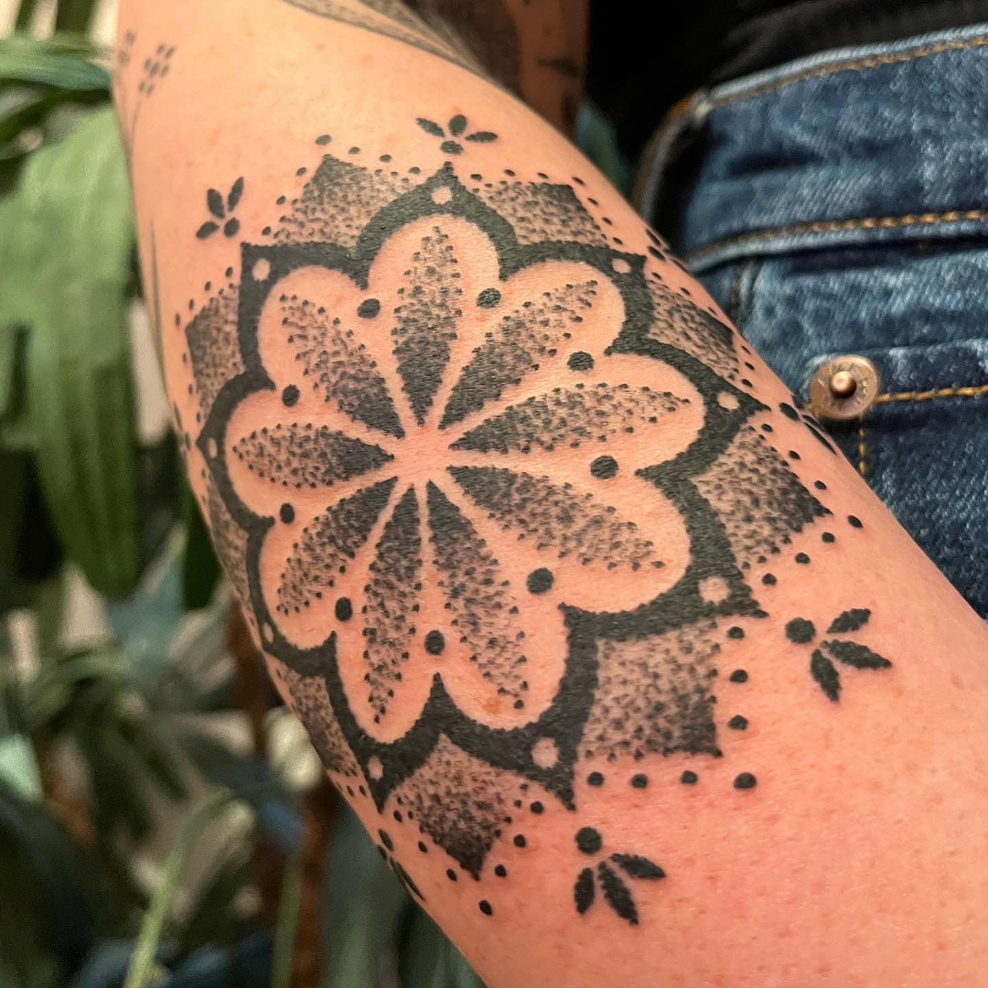Floral mandala dotwork tattoo on the forearm by kevvy