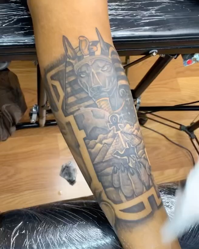 Ancient Egyptian deity geometric tattoo on the forearm by Azaan (Zanye), Birmingham, Alabama