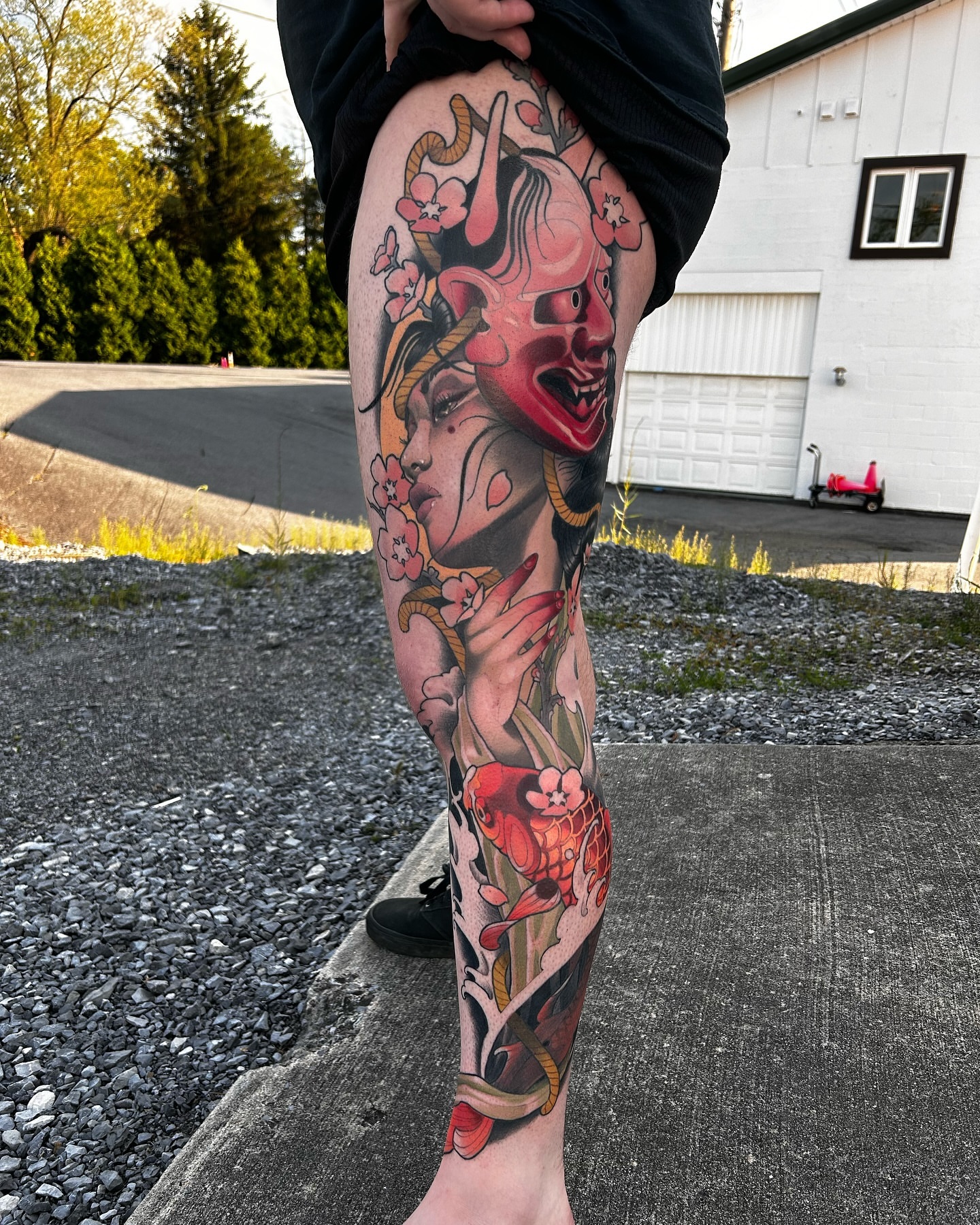 Geisha and demon mask japanese irezumi tattoo on the thigh by Levi Murphy