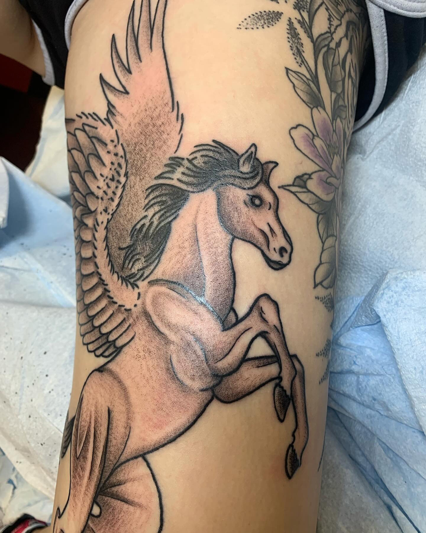 Pegasus dotwork tattoo on the forearm by Cody Marl