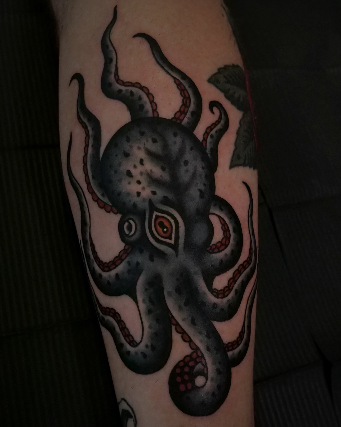 Octopus American traditional tattoo on the forearm by Brandon Murphy