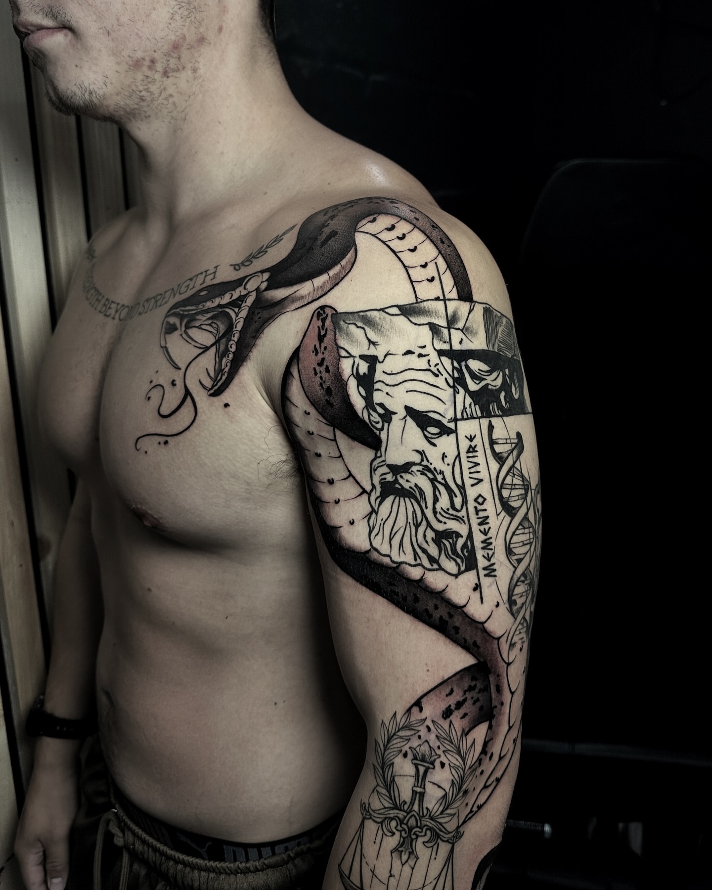 Ancient warrior realism tattoo on the shoulder by Alejo Ibanez Tattoo