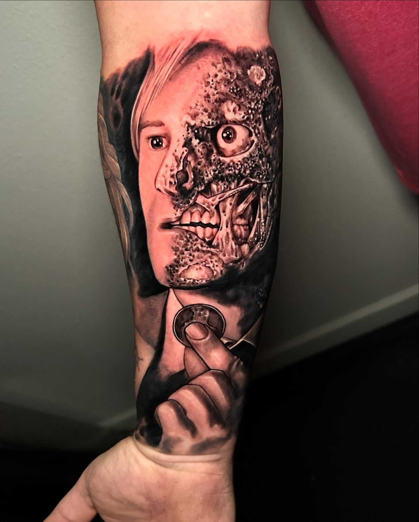 Human face realism tattoo on the forearm by Cuzmatt