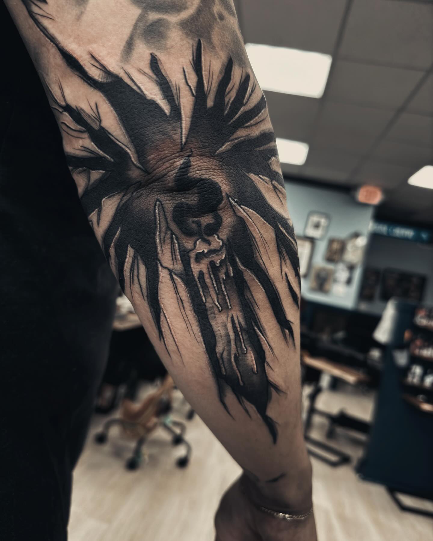 Skull with dripping blood dark realism tattoo on the forearm by 🌙Jose Maldonado🌙