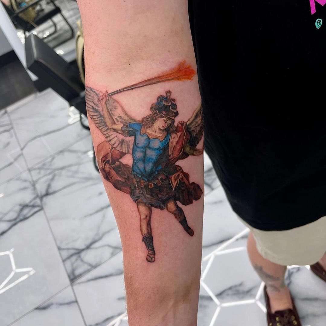 Angelic warrior realism tattoo on the forearm by Austin Jones
