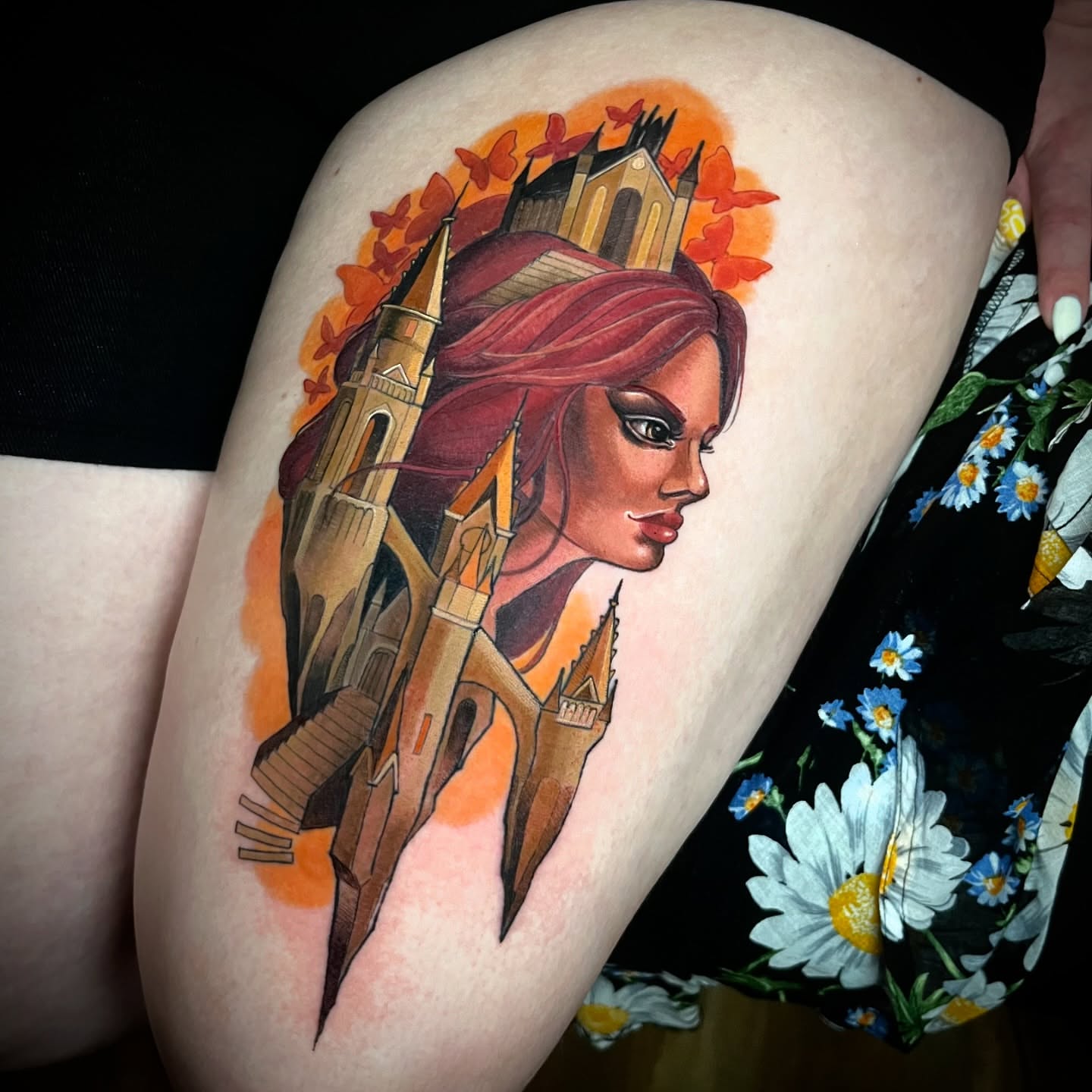 Castle and woman realism tattoo on the thigh by Jessica Brown