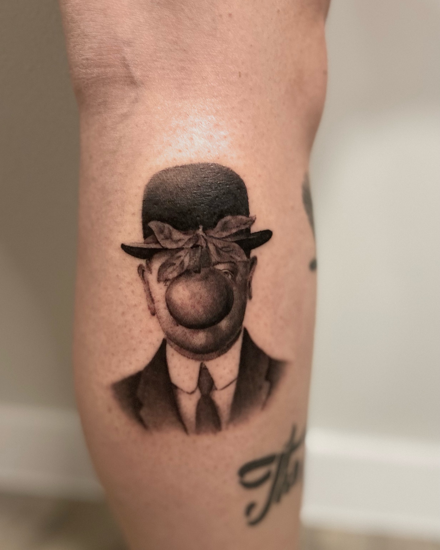 Apple man realism tattoo on the forearm by Truett Payton
