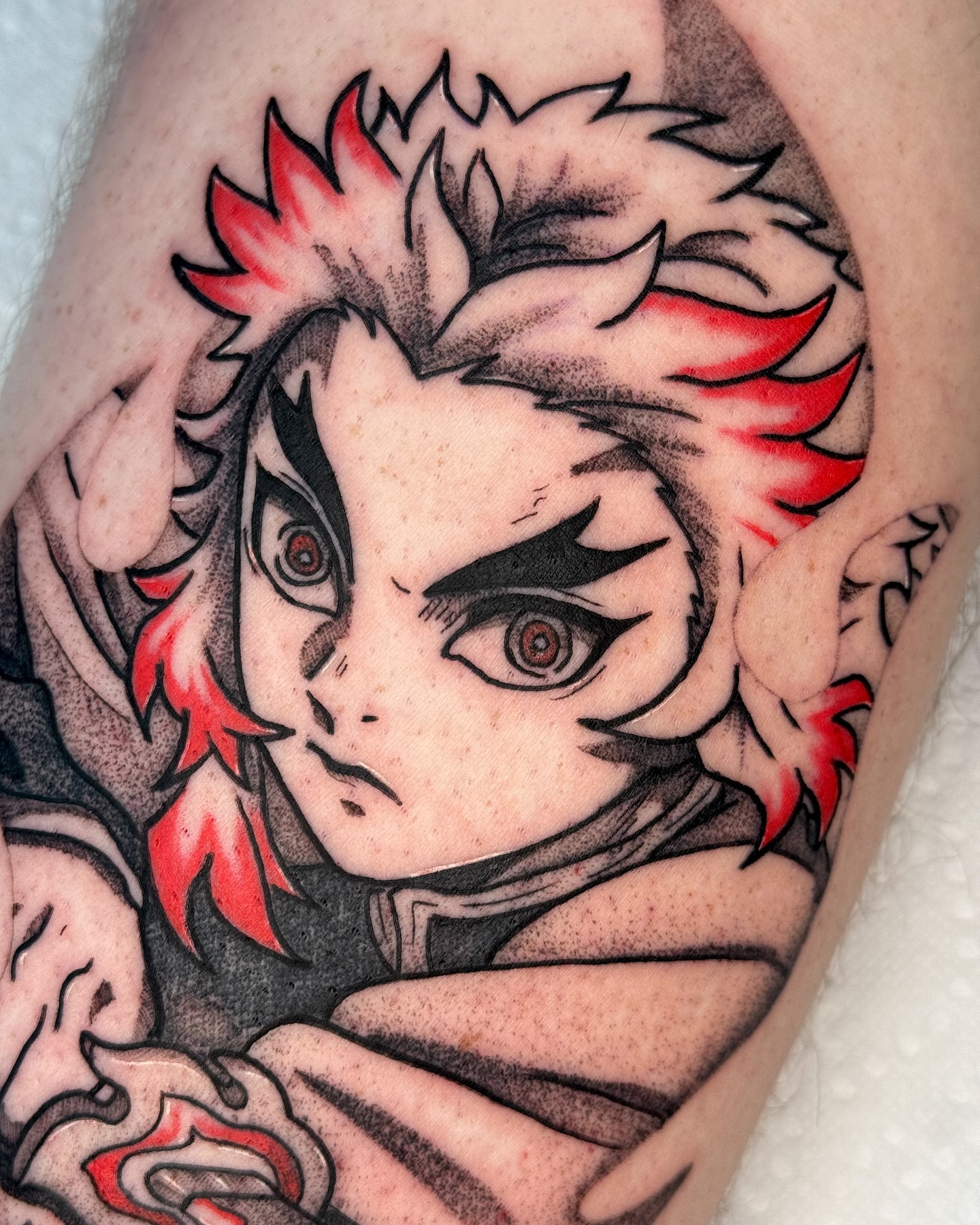 Anime character anime tattoo on the forearm by Tony Murray