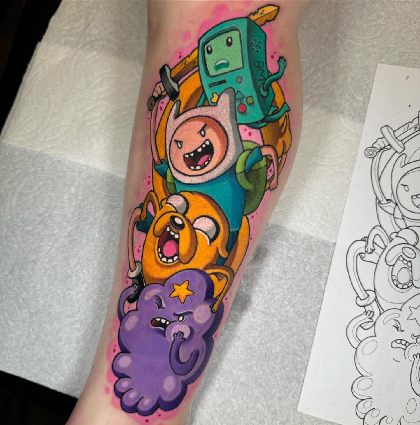 Adventure Time characters new school tattoo on the forearm by Jon Leighton