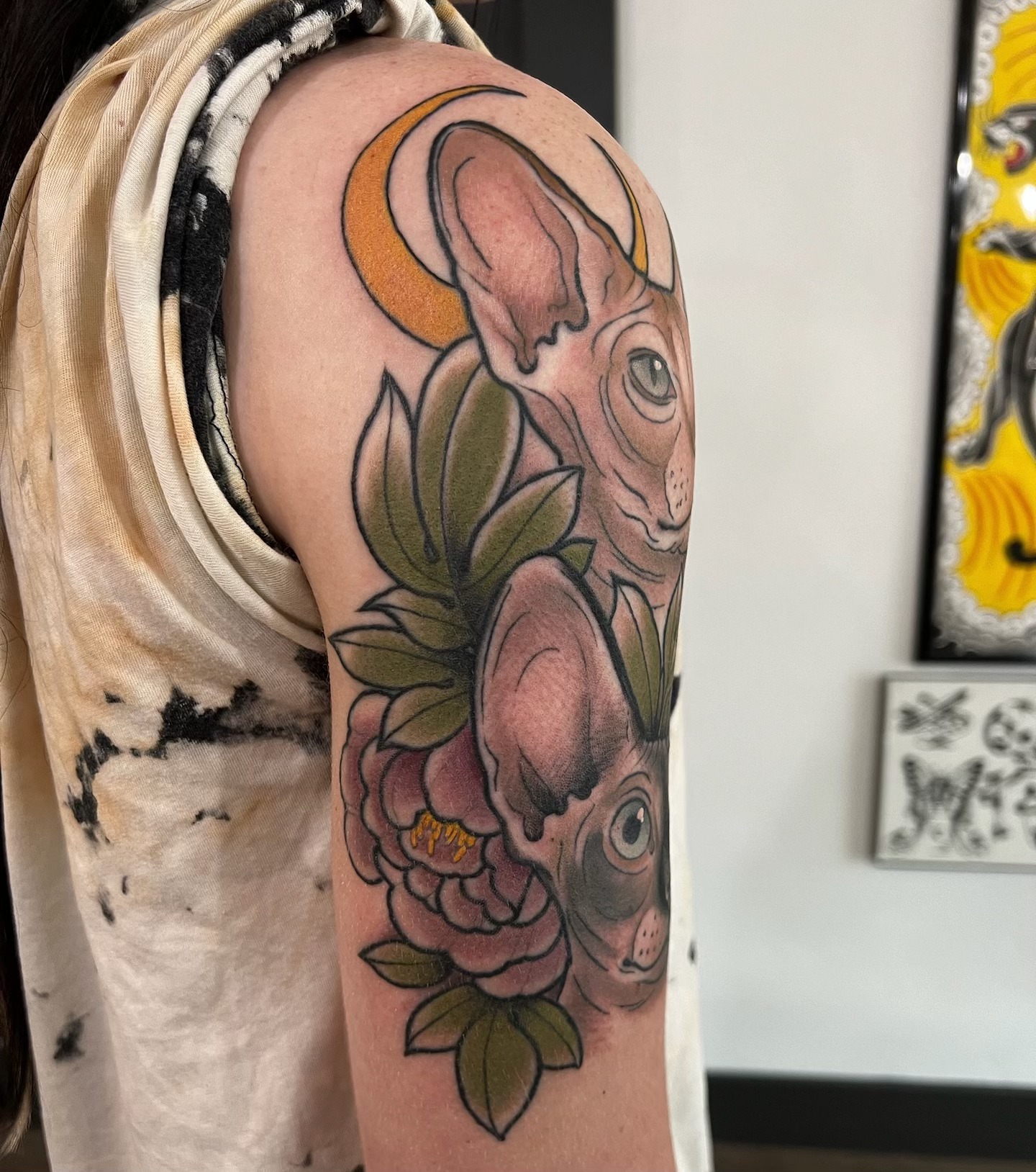 Cat and flowers American traditional tattoo on the upper arm by Kyle Olson, Salt Lake City, Utah
