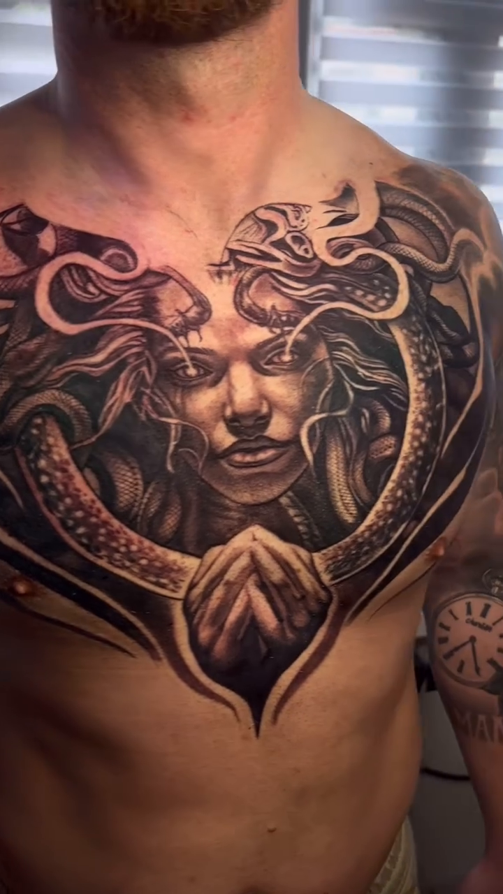 Medusa head with snakes realism tattoo by Abel Deida