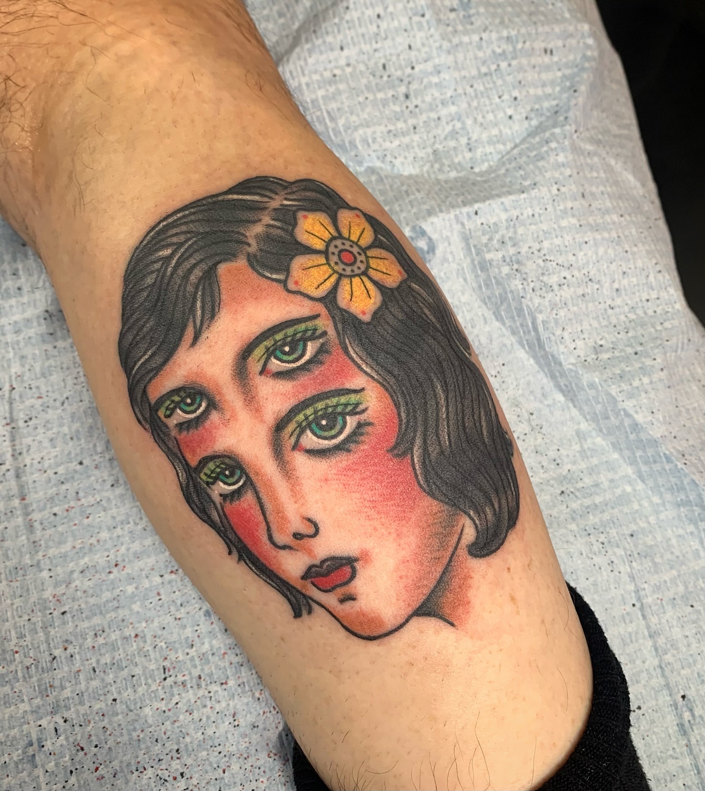 Woman with flower American traditional tattoo on the forearm by ✞ Keath Supsic ✞