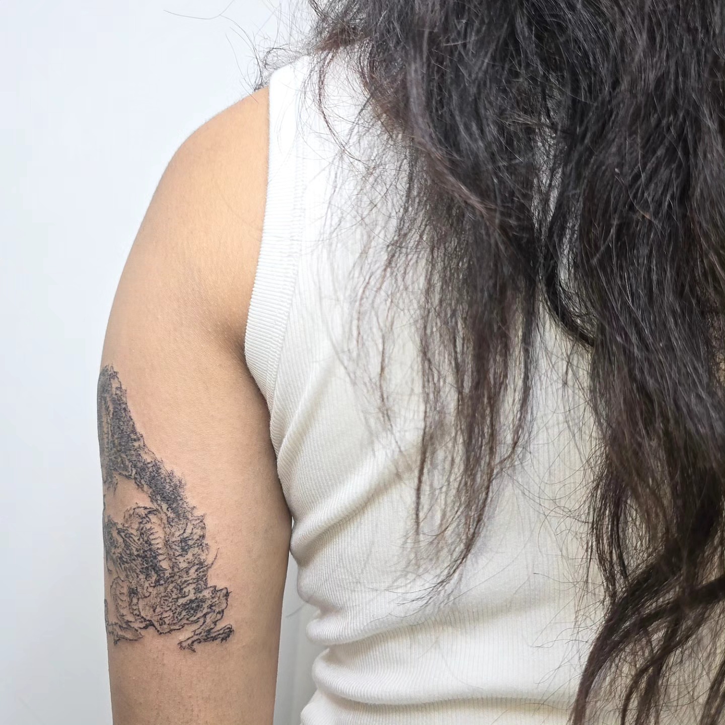 Dragon black and grey tattoo on the upper arm by Branded ꪉꪗ Brandon ∴ b.liew ∴ Tattoo ∴ NYC