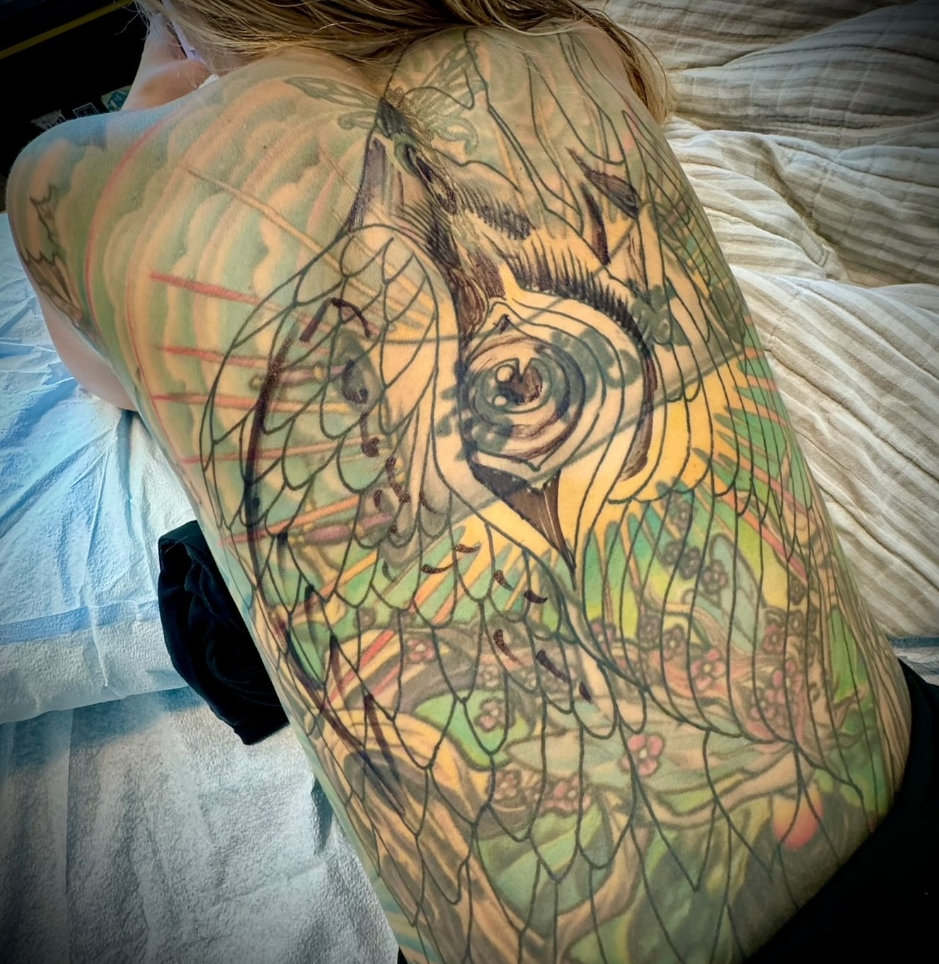 Owl neo-traditional tattoo on the back by Brian Hutflies