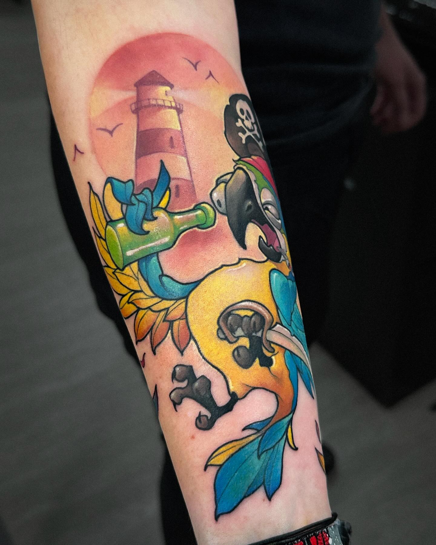 Pirate parrot new school tattoo on the forearm by Lena Aleksandrova
