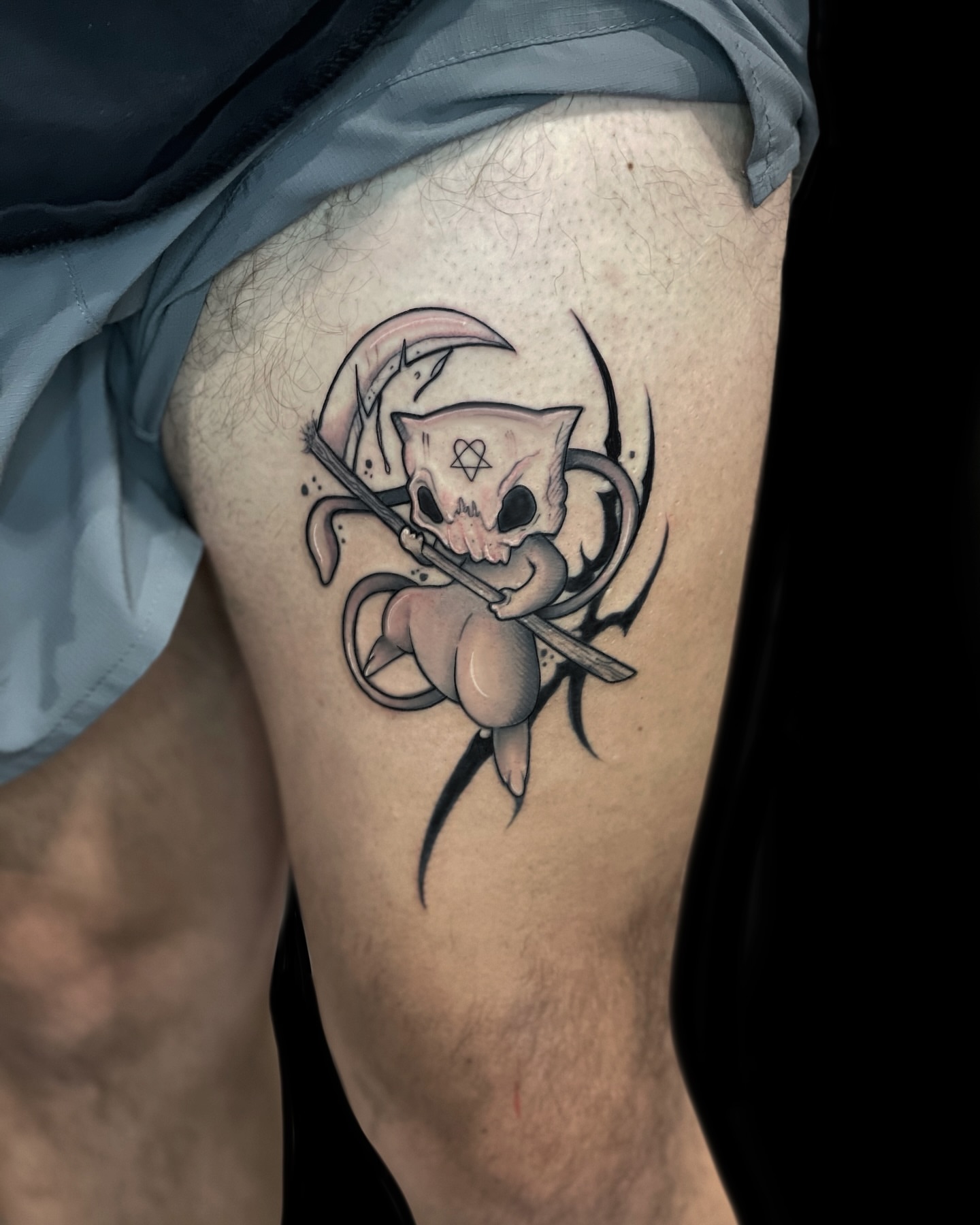 Cat skull with scythe neo-traditional tattoo on the thigh by Turk
