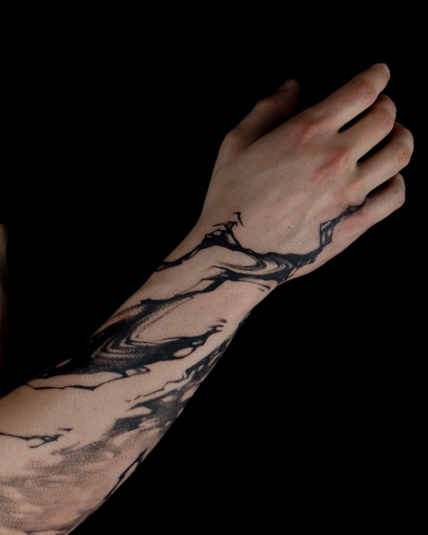 Abstract swirls dotwork tattoo on the forearm by Pietro Moleti