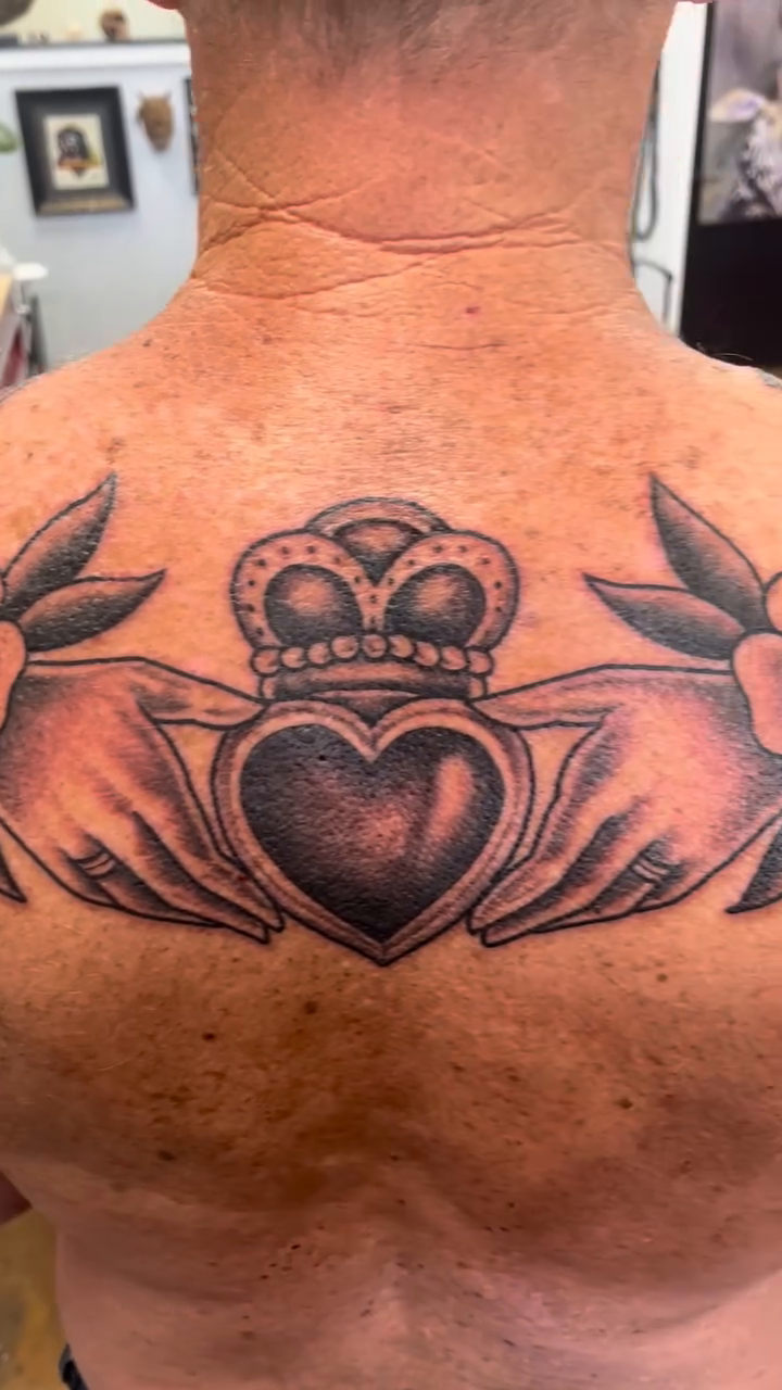 Claddagh with flowers American traditional tattoo by Allie Tippets, Gilbert, Arizona