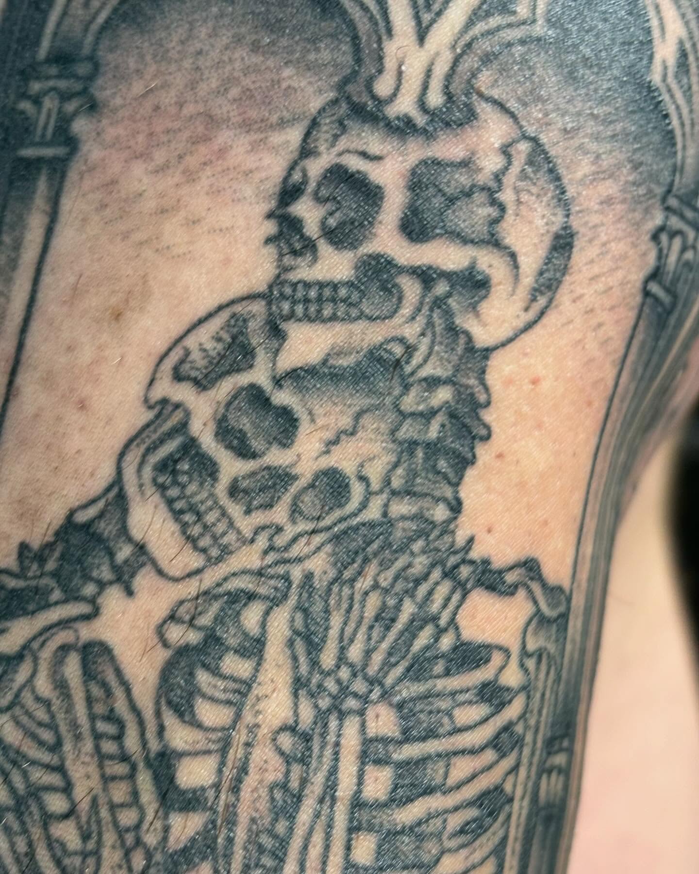 Skull black and grey tattoo on the forearm by Ares Rhodes