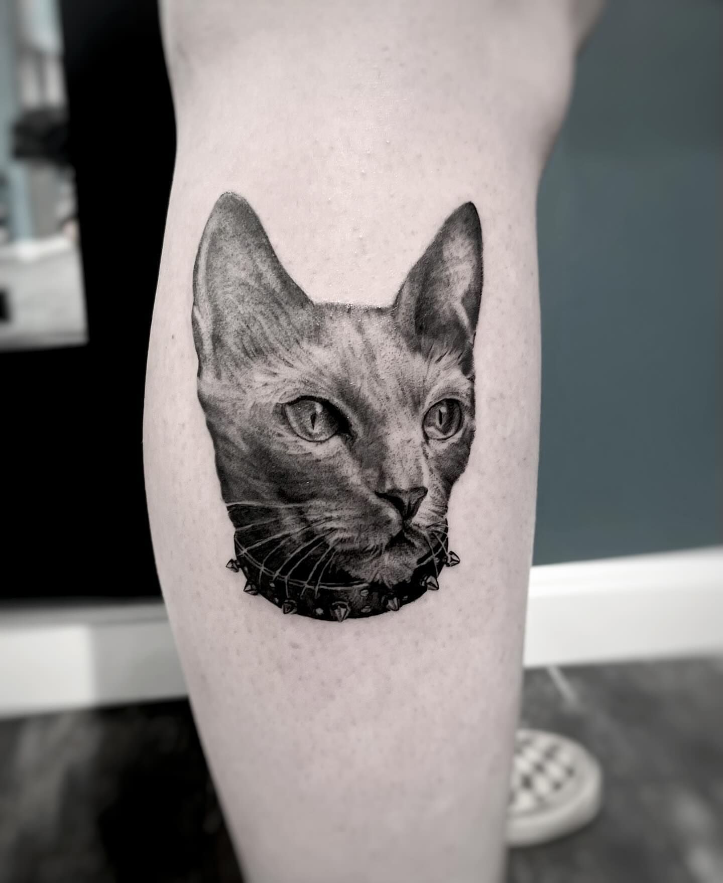 Cat realism tattoo on the forearm by Lee Ranco