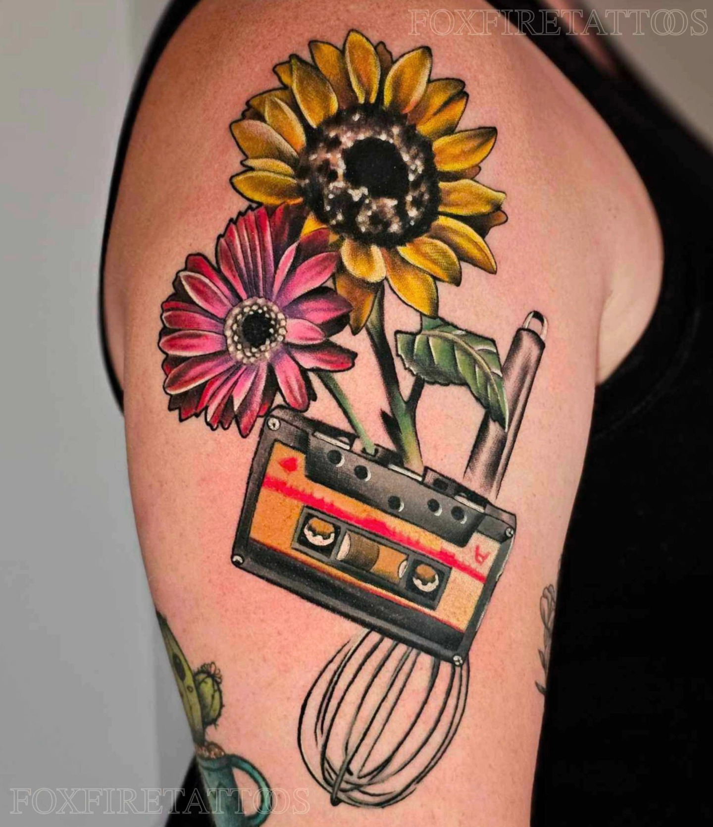 Sunflowers and cassette tape American traditional tattoo on the shoulder by Lindsey Chevalier - KCMO TATTOO ARTIST