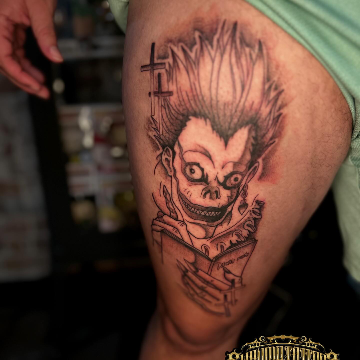 Riff Raff dark realism tattoo on the thigh by Marques Neal
