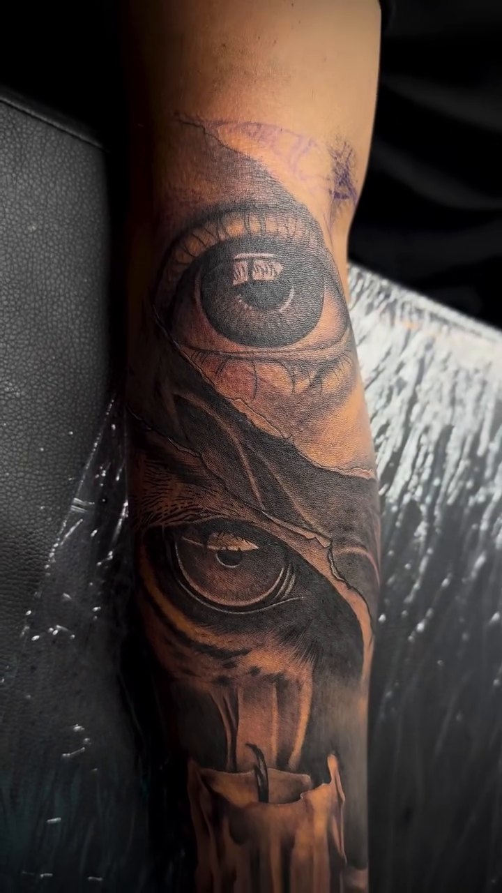 Eye and candle realism tattoo by Anwon Johnson