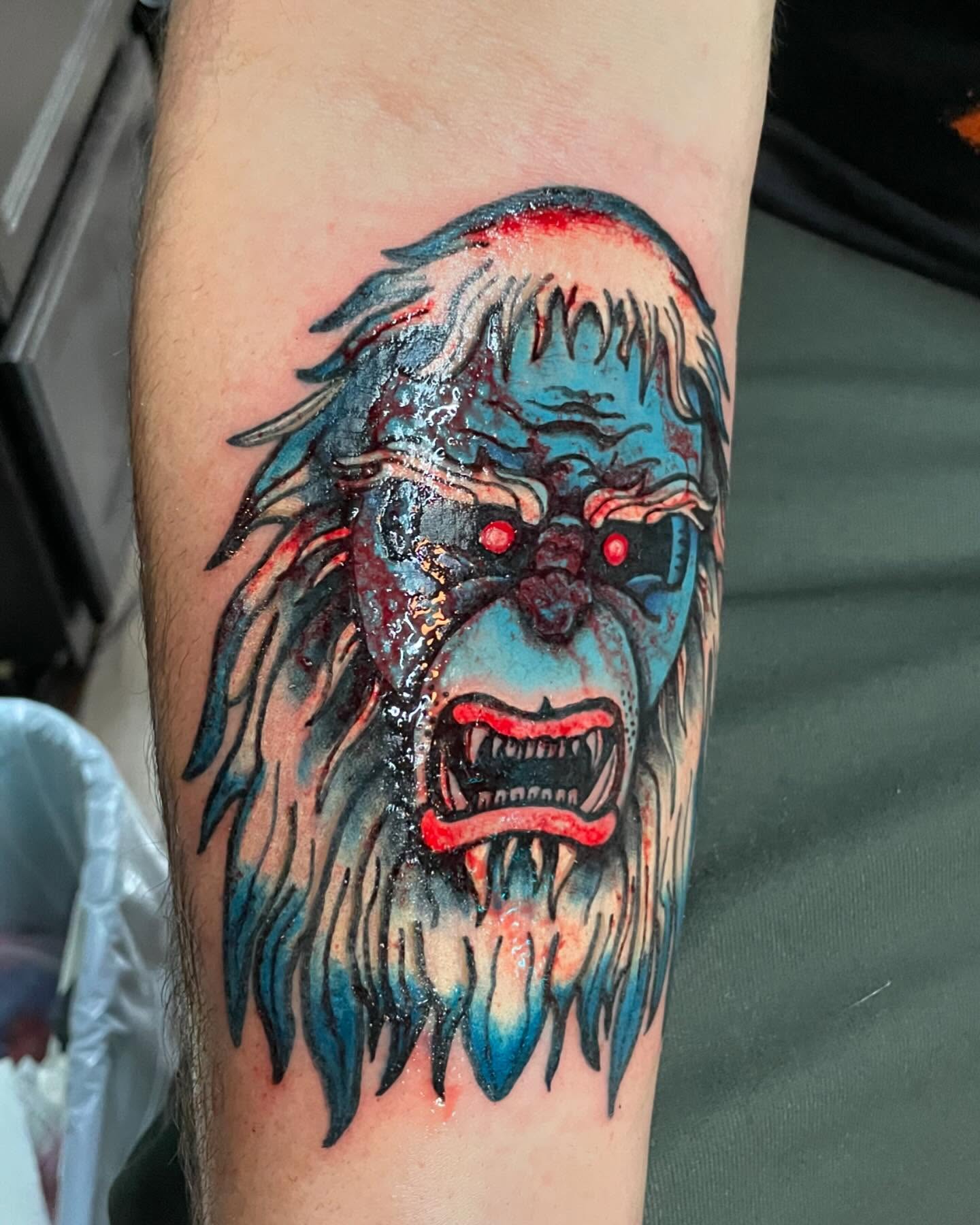 Bigfoot realism tattoo on the forearm by Mark Johnson [Tattoo Artist]