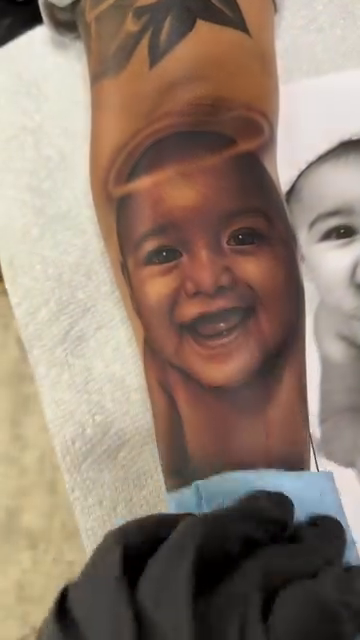 Baby portrait realism tattoo by Jason Martinez