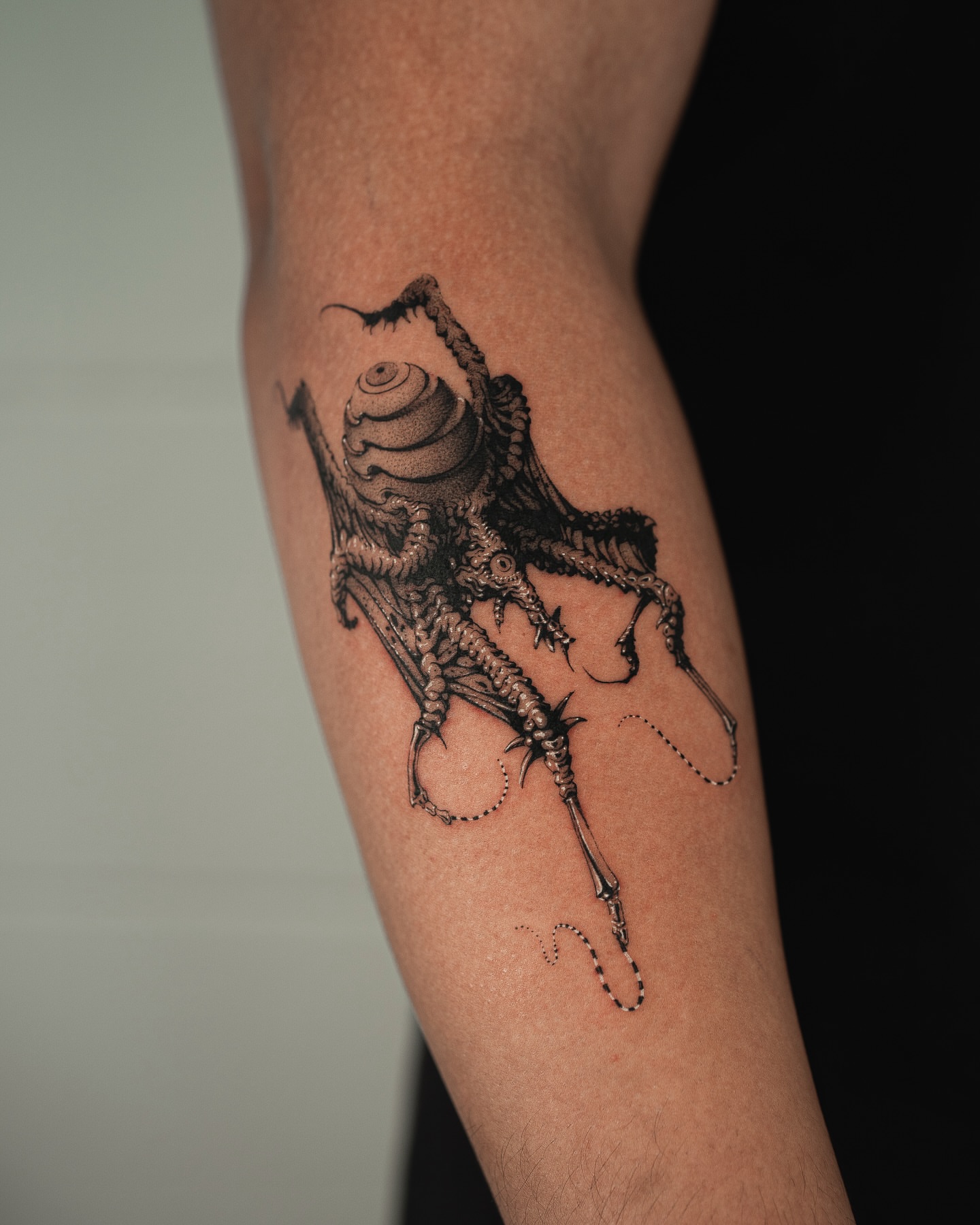 Octopus geometric tattoo on the forearm by Yujhi