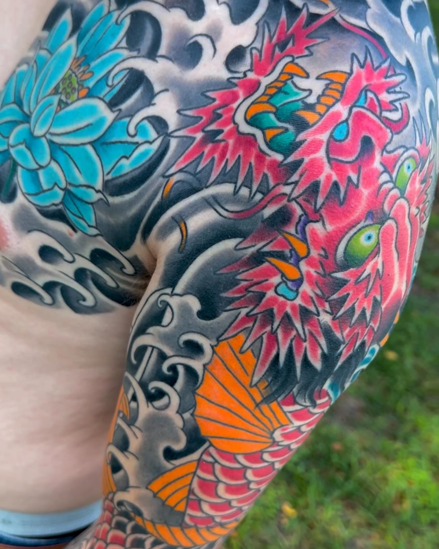 Dragon and chrysanthemum japanese irezumi tattoo on the forearm by Scott Allen Cooksey, Plano, Texas