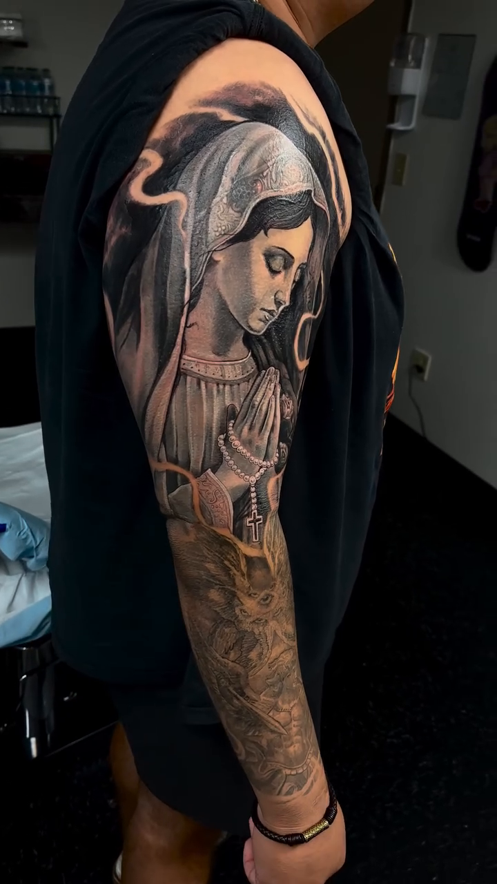 Tattoo by @tovar_tattoos — realism, black_and_grey