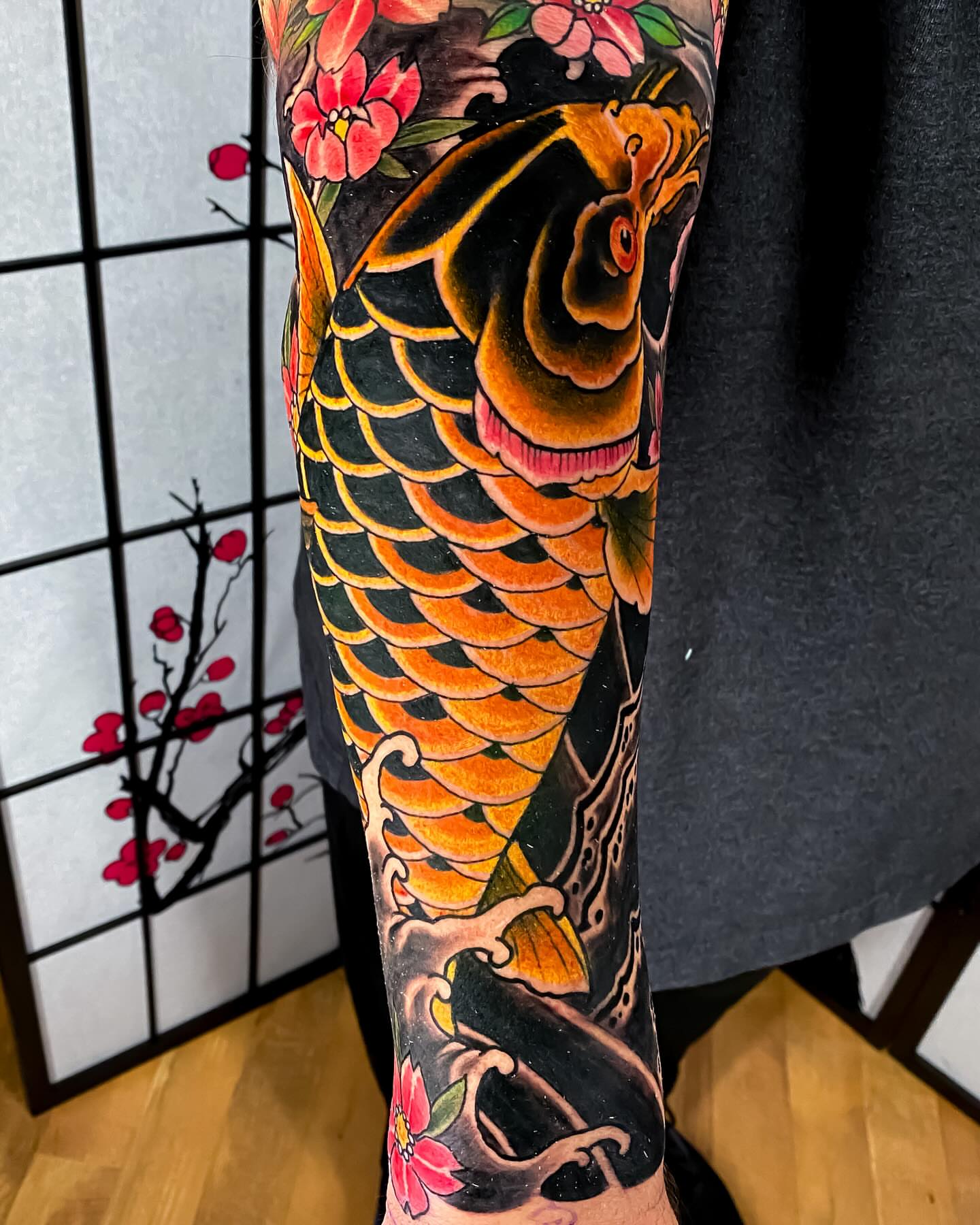 Koi fish japanese irezumi tattoo on the forearm by Eric James, Phoenix, Arizona