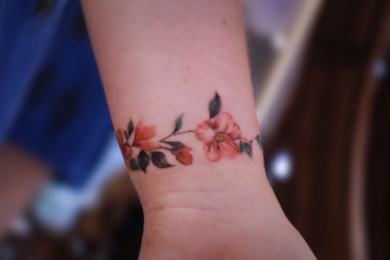 Floral design new school tattoo on the forearm by Yu Chen