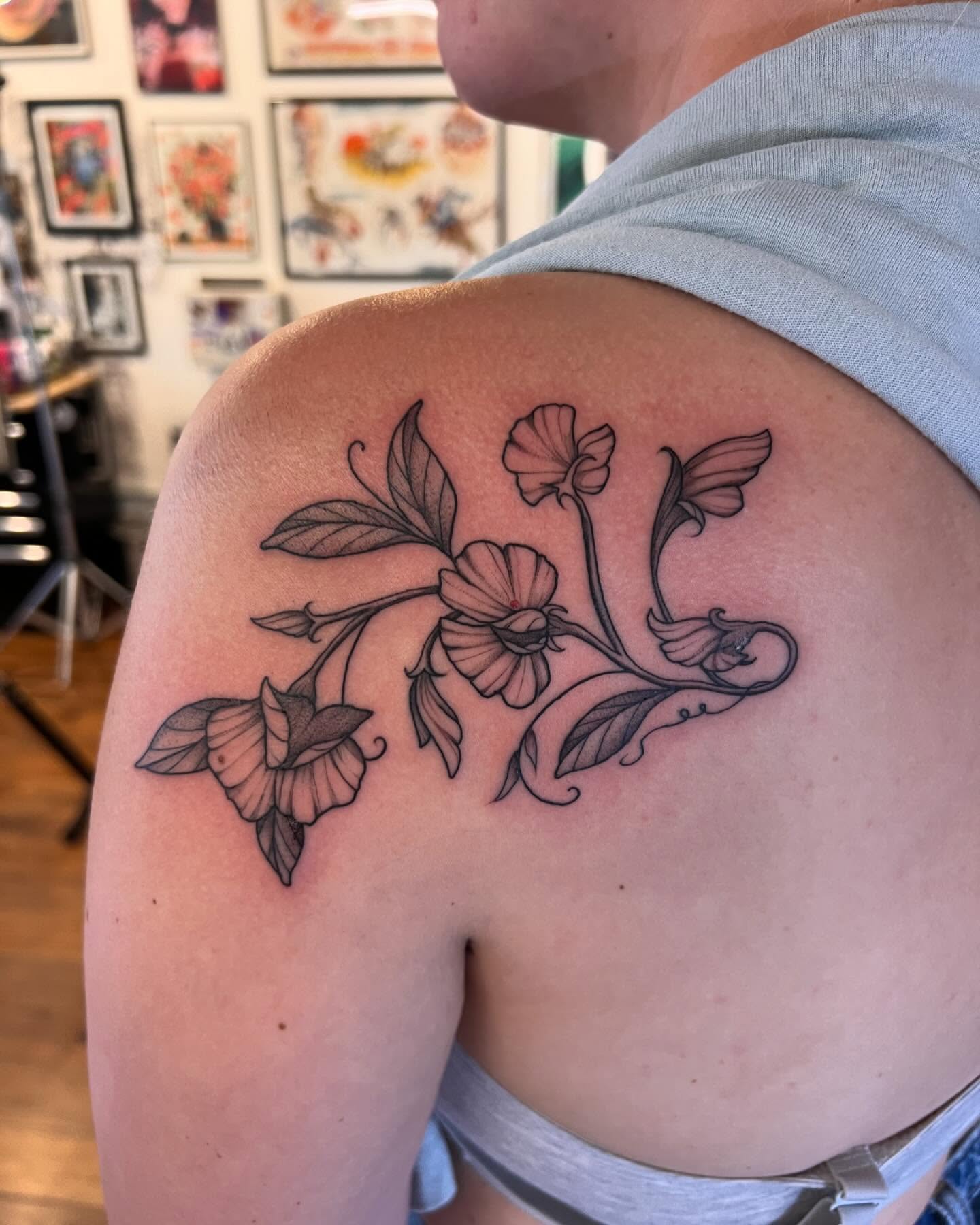 Flower bouquet black and grey tattoo on the shoulder by Tasha Venola, Bellingham, Washington