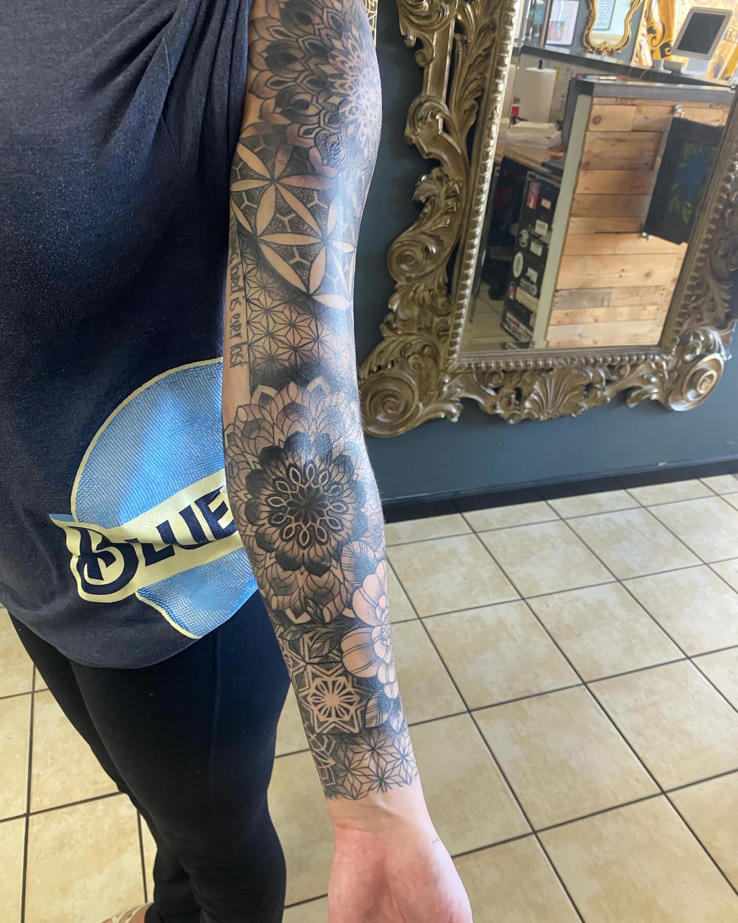 Geometric patterns geometric tattoo on the forearm by Nicholas Jones
