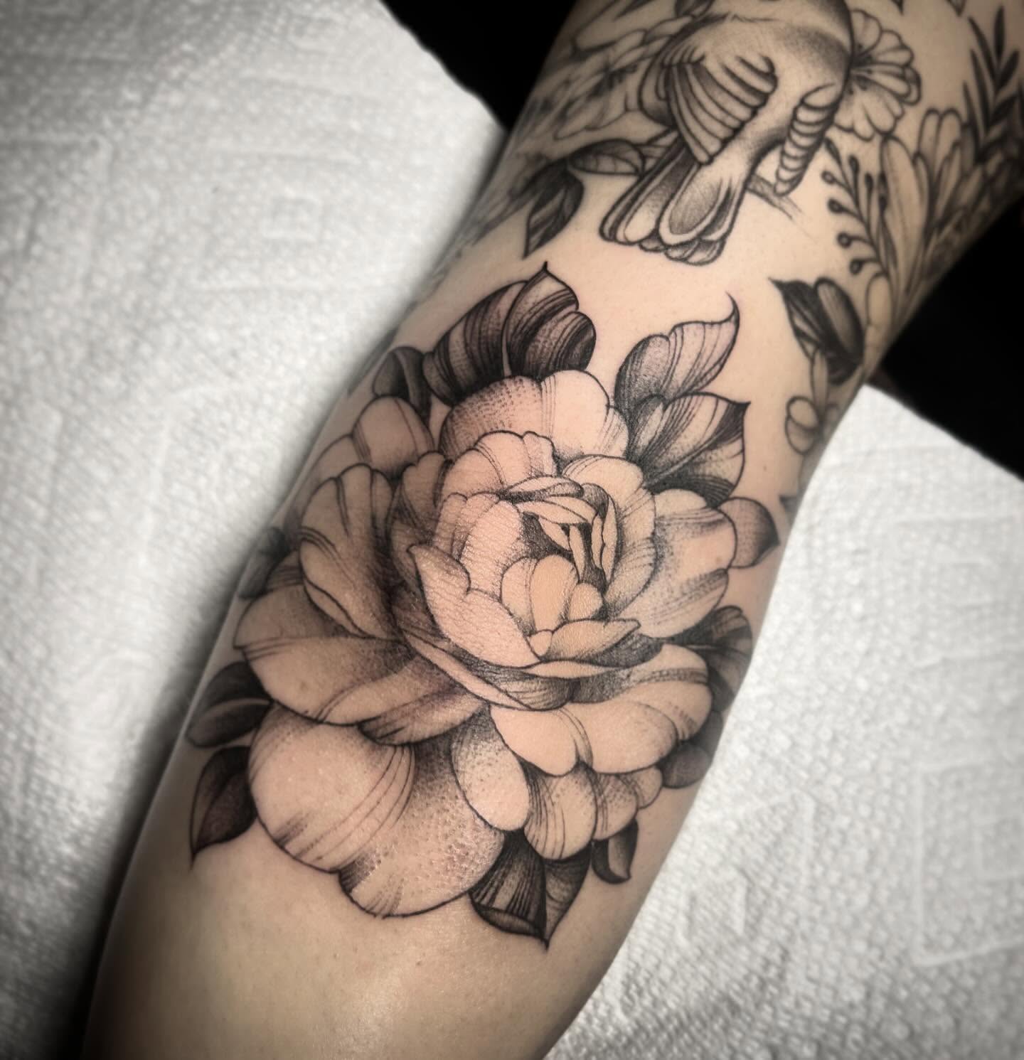 Peony realism tattoo on the forearm by Lena Lawrence
